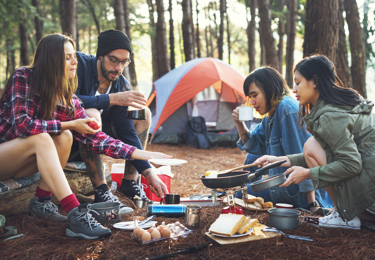 Friends camping in the forest.