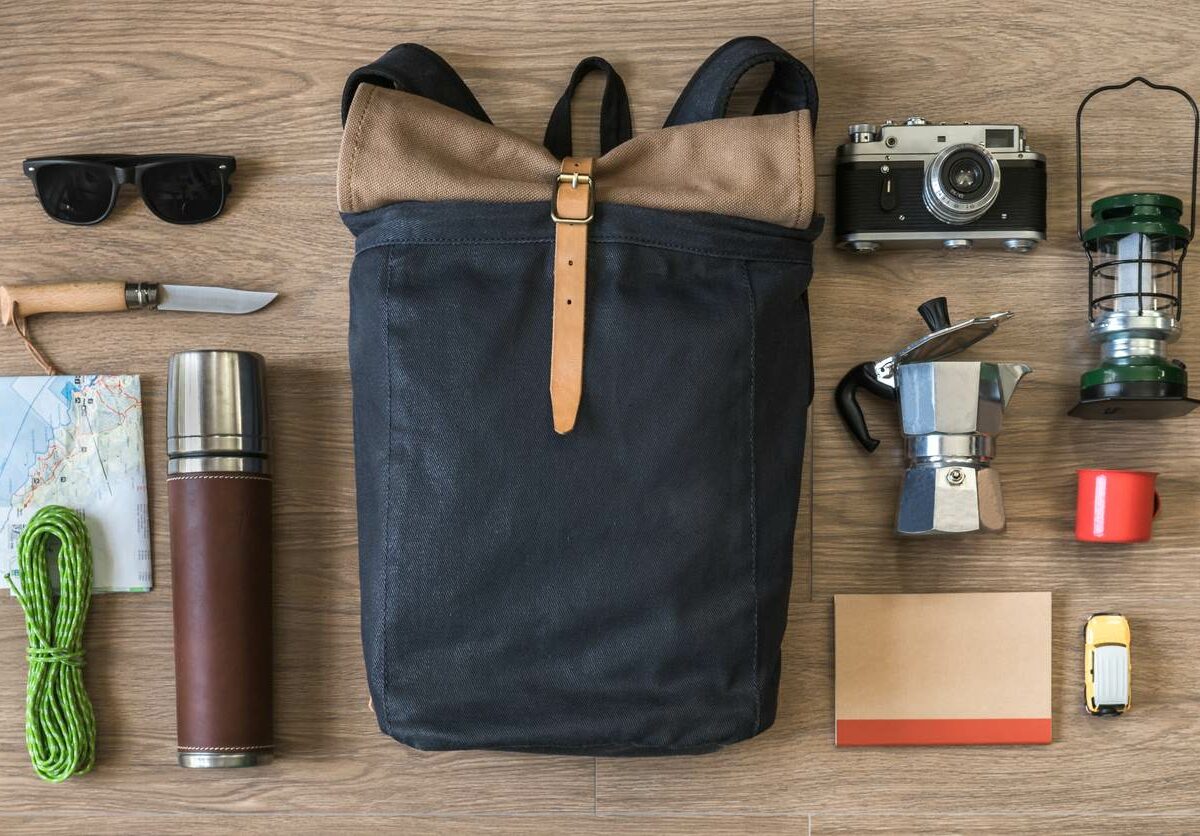 A top view of RV camping gear set on a wooden table.