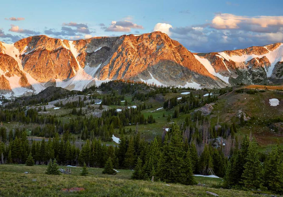 The Medicine Bow Mountain range is covered with snow near Laramie, WY.
