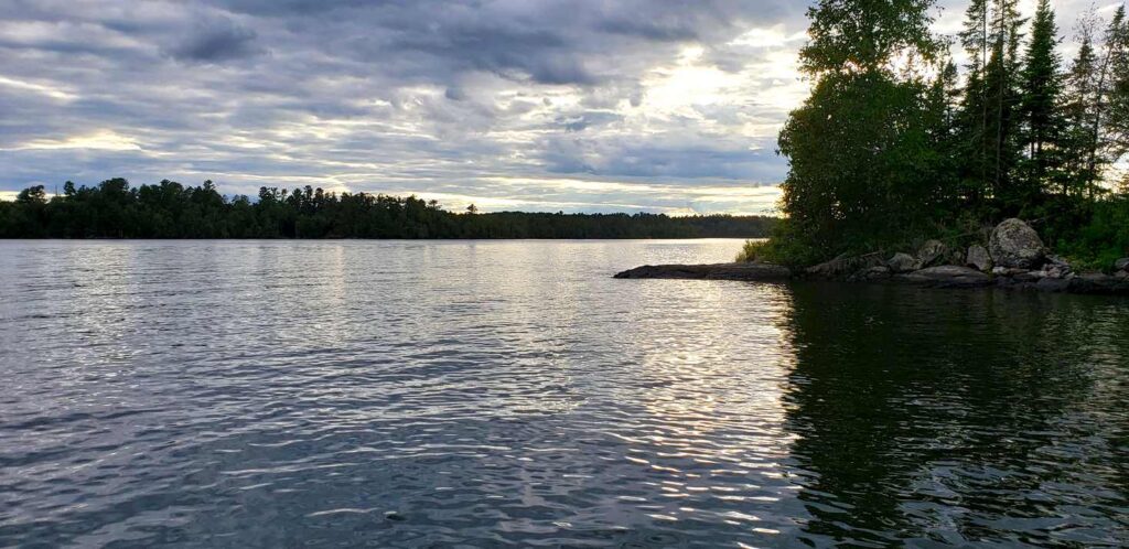 The sunset and clouds seen on a lake in Minnesota.